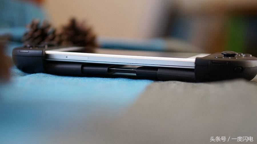 飞智wee手柄支持ios15.0,飞智游戏手柄wee拉伸手柄