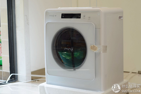 洗衣机在使用过程中怎么把门开开,洗衣机怎么先把门打开
