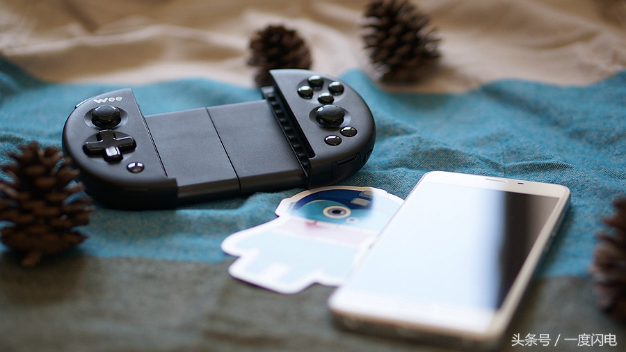 飞智wee手柄支持ios15.0,飞智游戏手柄wee拉伸手柄