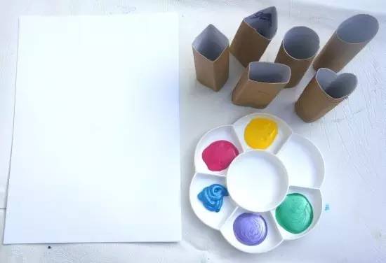 幼儿园卷纸筒环保手工作品,儿童手工涂鸦画纸