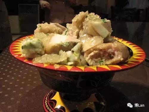 彝族特色菜肴坨坨肉图片,彝族特色酒