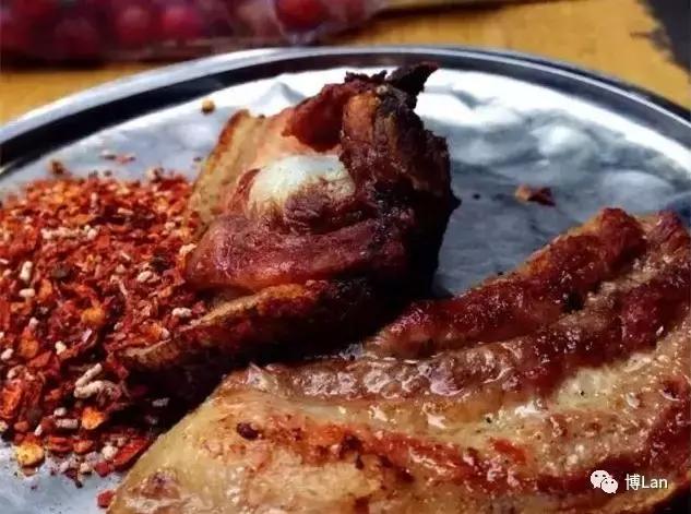 彝族特色菜肴坨坨肉图片,彝族特色酒