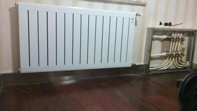 普通暖气片怎么改成电吹风,暖气片是如何改成电加热暖气片