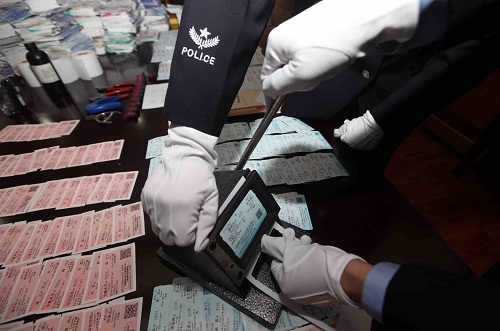 犯罪嫌疑人购买火车票,用假火车票报销属于什么罪