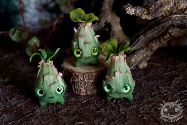 她做的娃娃表情都好奇怪啊！