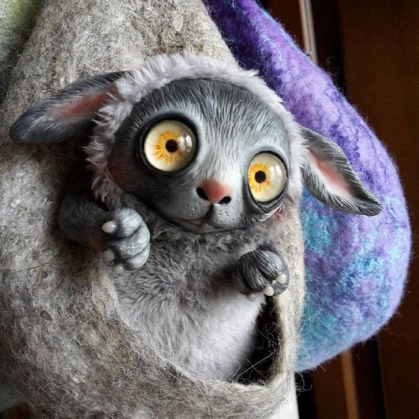 她做的娃娃表情都好奇怪啊！