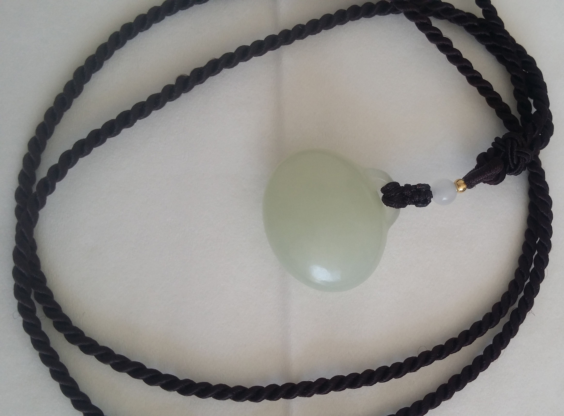 说一下我入手的第一块小石头（和田玉锁）