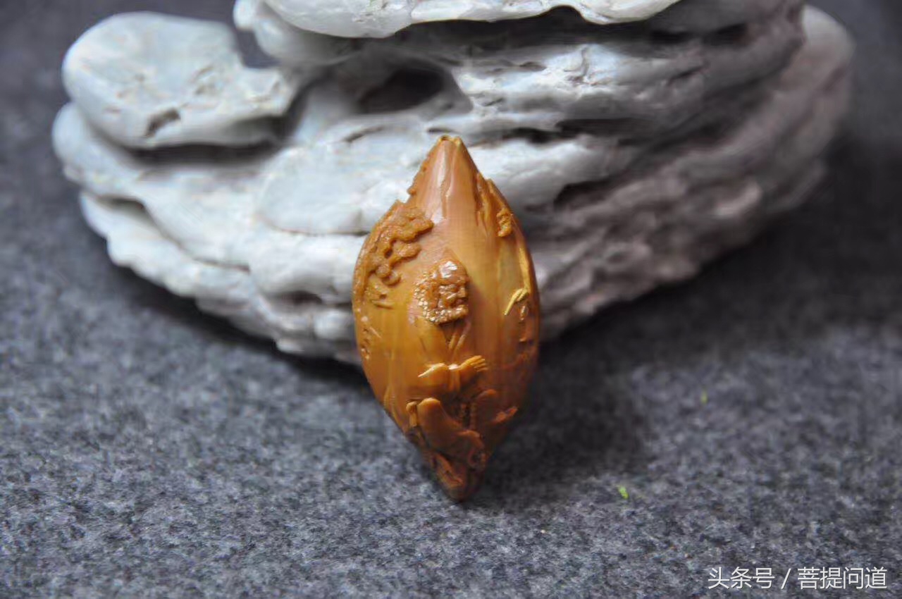 三藏橄榄核雕价位及图片,核雕三藏大师本人照片大全