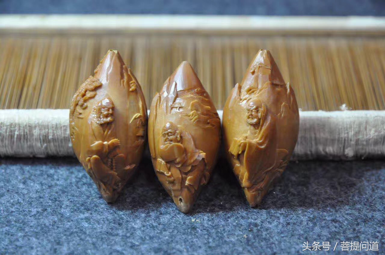 三藏橄榄核雕价位及图片,核雕三藏大师本人照片大全