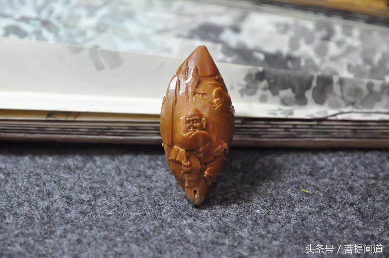 三藏橄榄核雕价位及图片,核雕三藏大师本人照片大全
