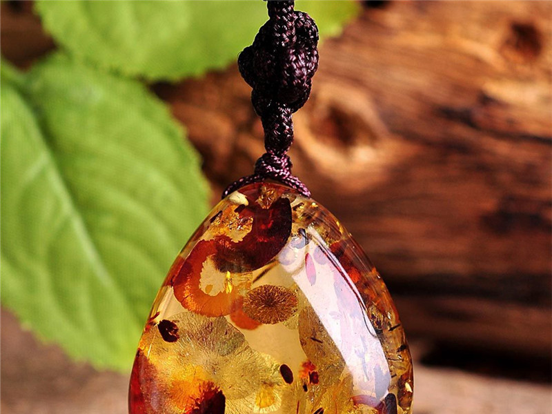 花珀人工爆花可以过检吗,人工爆花的花珀是假的吗