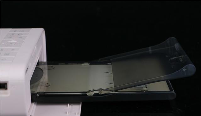 佳能selphycp1200墨盒取不出来,佳能selphycp910使用方法