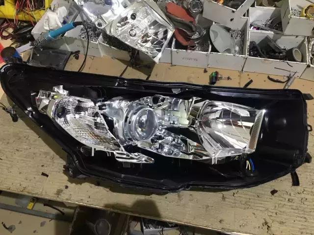 惠州新光源灯光升级,汉兰达原车灯发黄昏暗升级NHK德国版海五双光透镜!