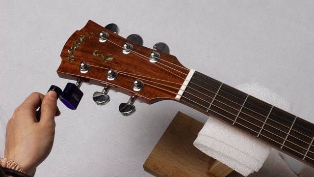 吉他弦怎么调软最好,新手怎么调吉他弦