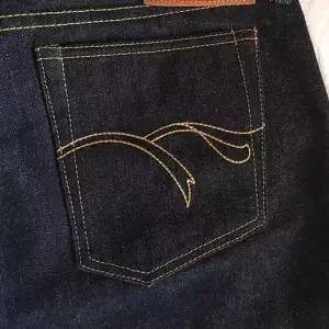 牛仔裤袋子什么牌子好,牛仔裤带花辨认