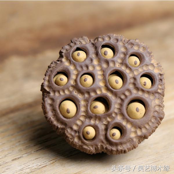 手把件是饰品吗,木制手玩把件