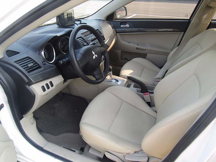 三菱evo油箱盖和翼神的区别,evo民用汽车