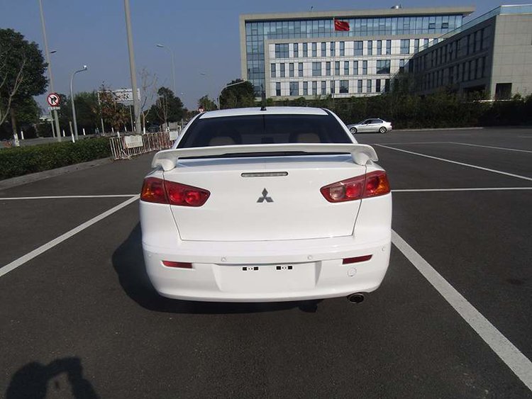 三菱evo油箱盖和翼神的区别,evo民用汽车