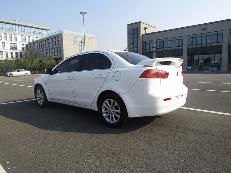 三菱evo油箱盖和翼神的区别,evo民用汽车