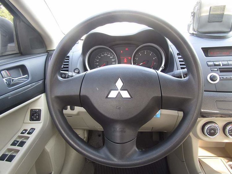 三菱evo油箱盖和翼神的区别,evo民用汽车