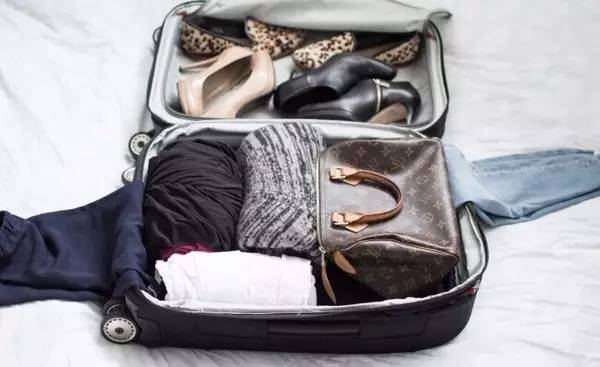 旅行收拾行李箱技巧,旅游旅行箱怎么整理