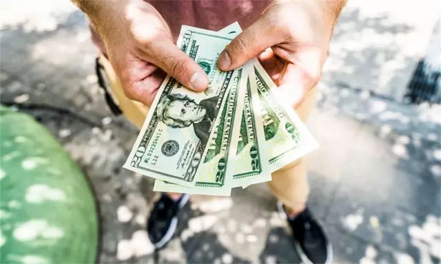 旅游回来剩的美金怎么办呢,旅游完剩下的外币