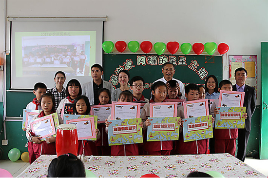 卡特彼勒苏州工厂志愿者访问当地打工子弟学校