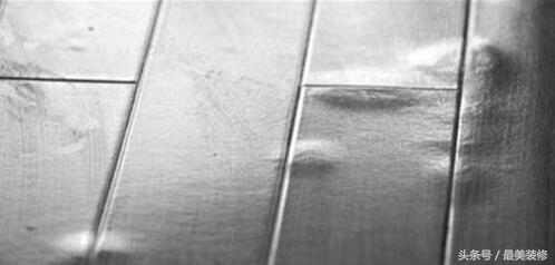 地板鼓起来了怎么补救,地板鼓起来了怎么重贴