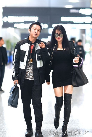邹市明冉莹颖夫妇运动,邹市明娇妻冉莹颖现身机场