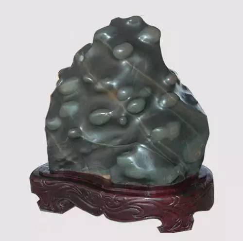 长满小疙瘩的石头,浑身起的密密麻麻的疙瘩不痒