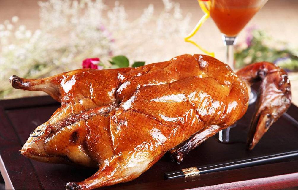 简述北京烤鸭的制作工艺流程,北京烤鸭的制作流程英语