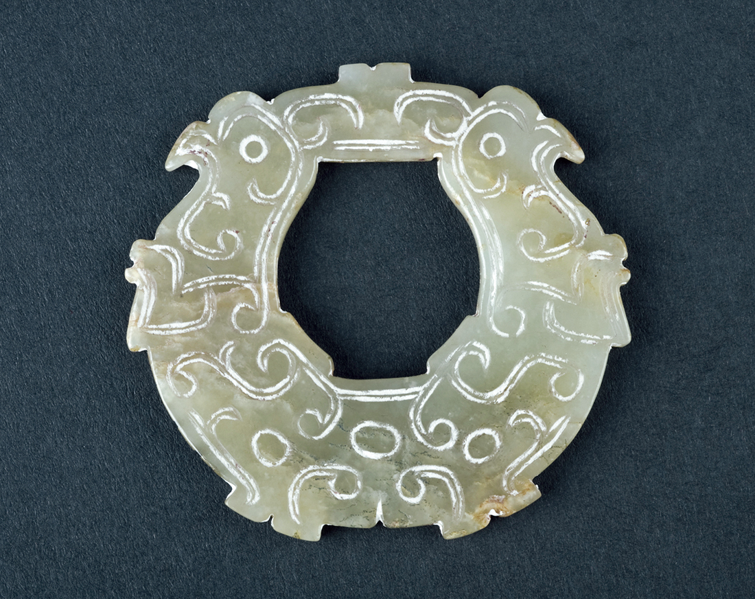 薛国故城出土*物文**——零圭断璧