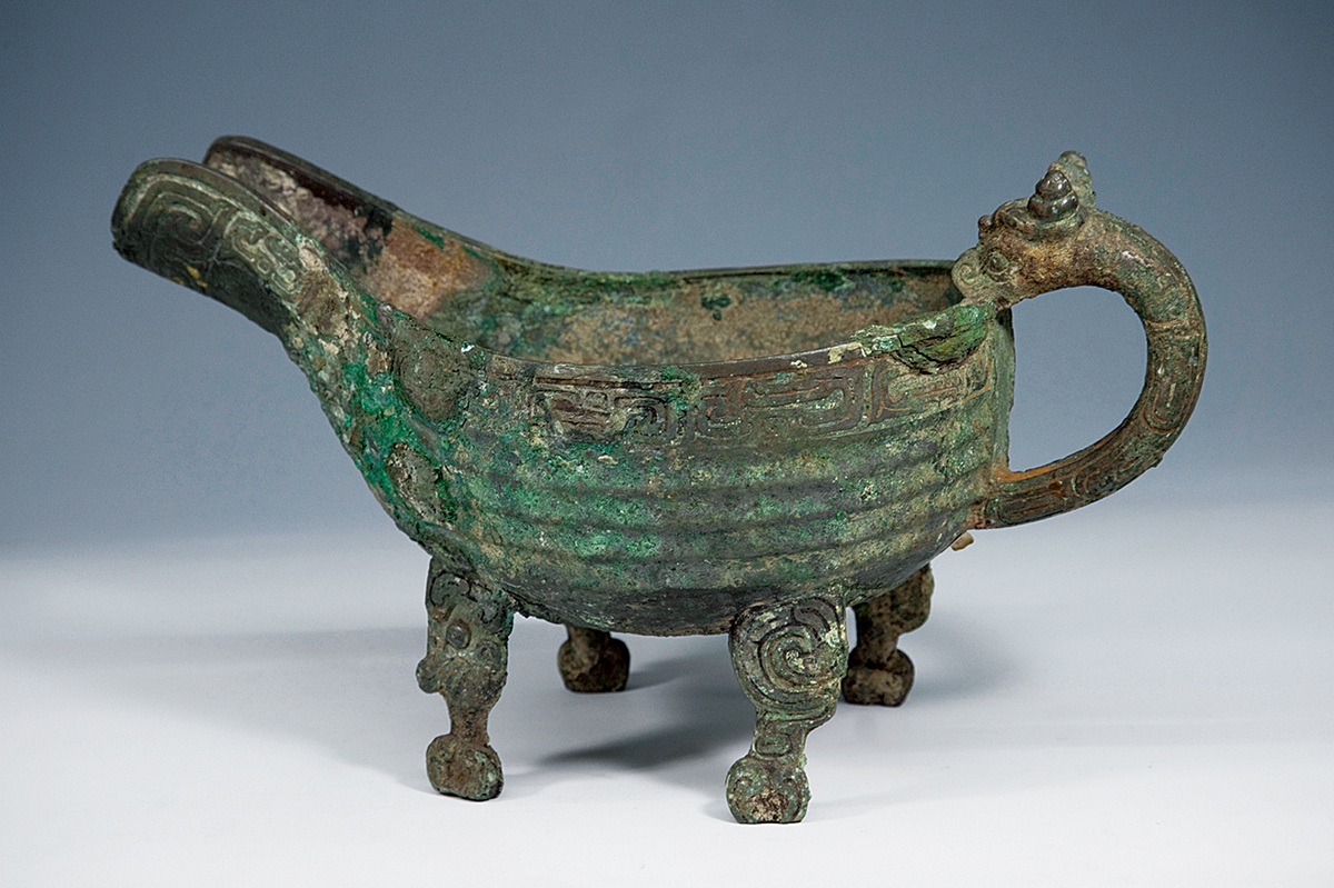 薛国故城出土*物文**——零圭断璧