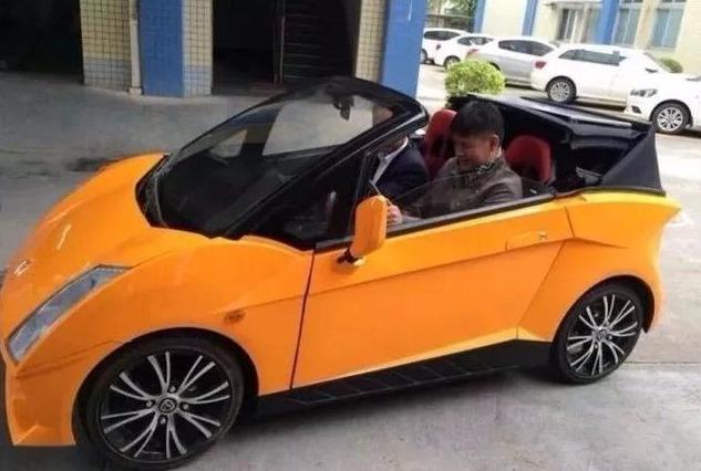 车标长得很像特斯拉标志的车,国产汽车标志像兰博基尼