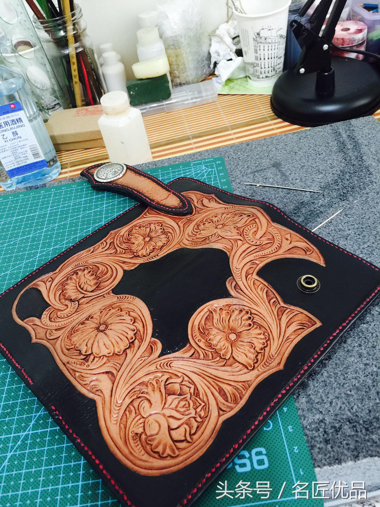 手工皮雕匠人钱包,皮雕手工钱包图片
