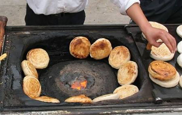 大叔卖早点月入2万,农村大爷卖早点20年赚多少钱