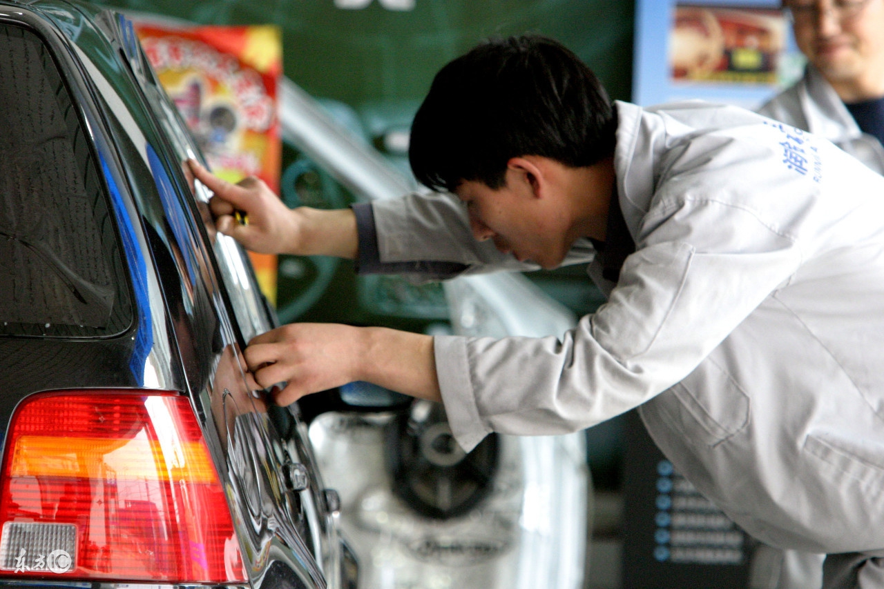 汽车贴膜后有气泡怎样解决,汽车贴膜以后怎么消除小气泡