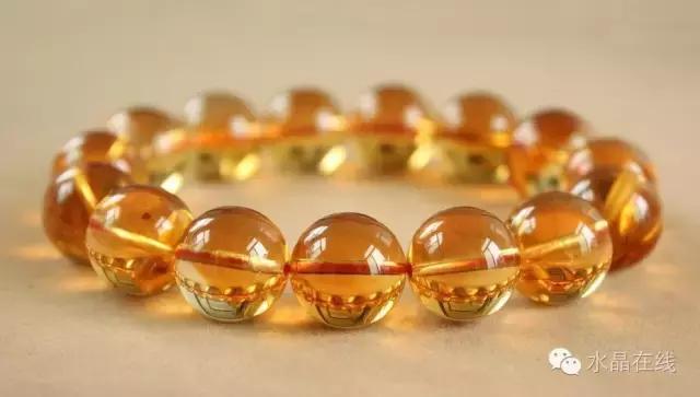 黄水晶千手观音吊坠真假,纯净体黄水晶怎么辨别真假