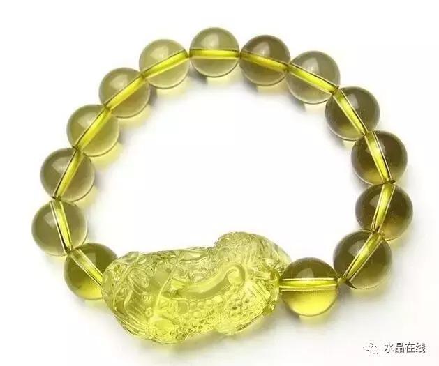 黄水晶千手观音吊坠真假,纯净体黄水晶怎么辨别真假