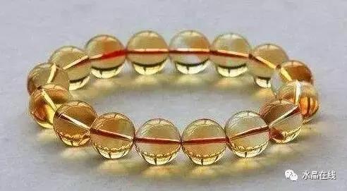 黄水晶千手观音吊坠真假,纯净体黄水晶怎么辨别真假