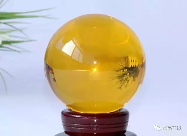 黄水晶千手观音吊坠真假,纯净体黄水晶怎么辨别真假