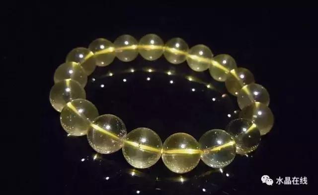 黄水晶千手观音吊坠真假,纯净体黄水晶怎么辨别真假