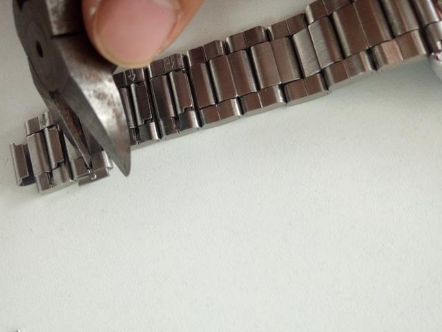 手表表带太锋利怎么处理,手表金属表带太长