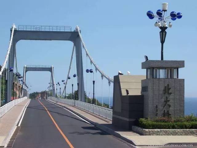 大连七座桥,大连金湾桥历史