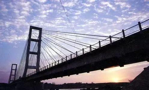 大连七座桥,大连金湾桥历史