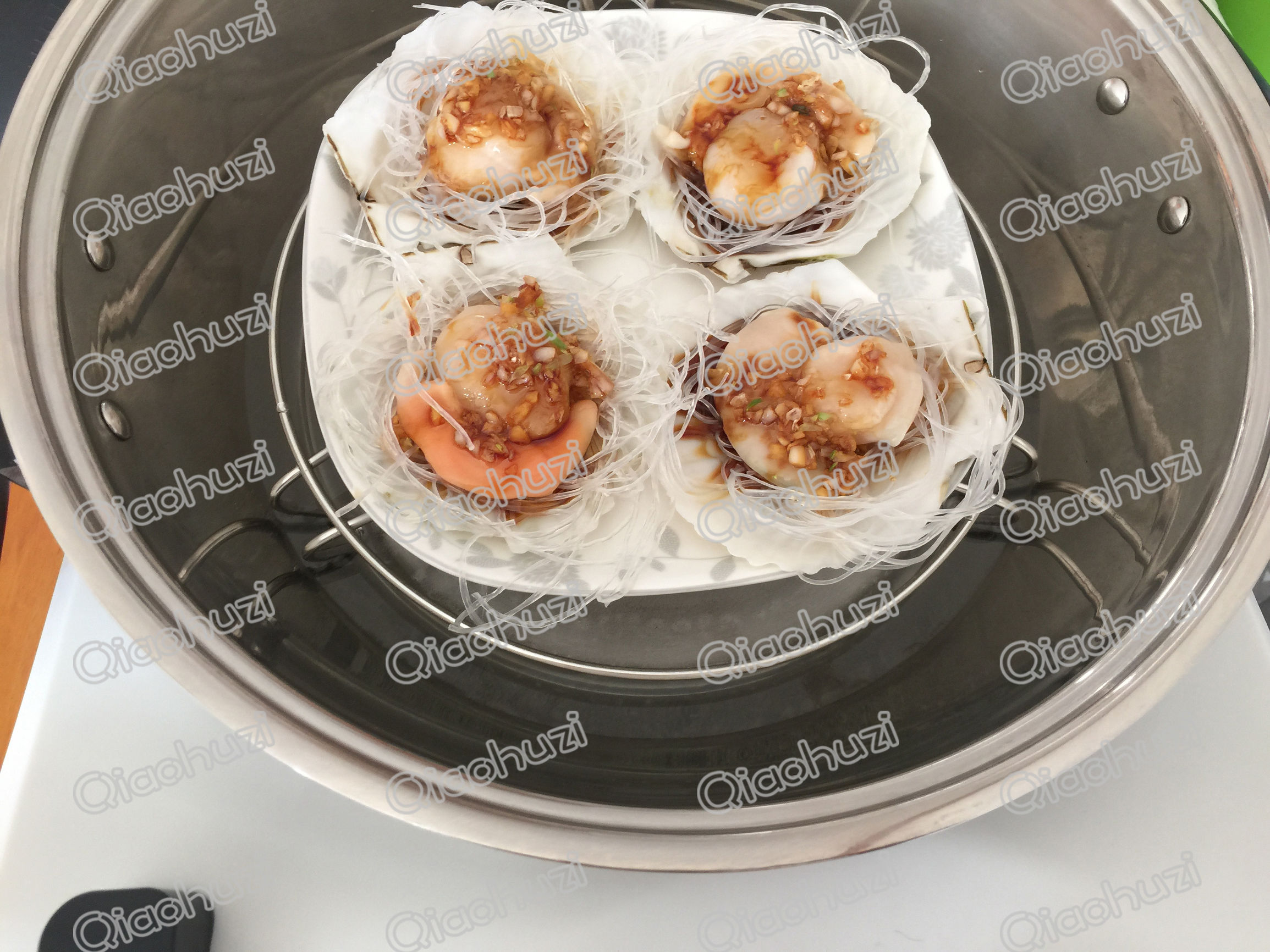 蒜蓉粉丝蒸扇贝这样做鲜香入味,家庭现成的蒜蓉粉丝蒸扇贝怎么弄