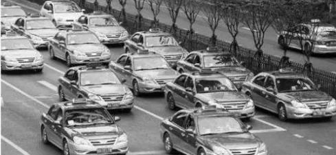 的士闯红灯,的士闯红灯公司罚停运合理吗