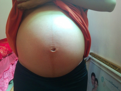 孕妇到预产期了还不生怎么办,孕妇快到临产期有什么反应