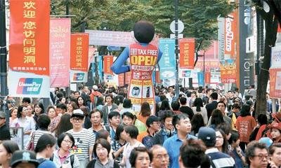 中国游客在日本疯狂购物,中国游客去日本韩国买东西