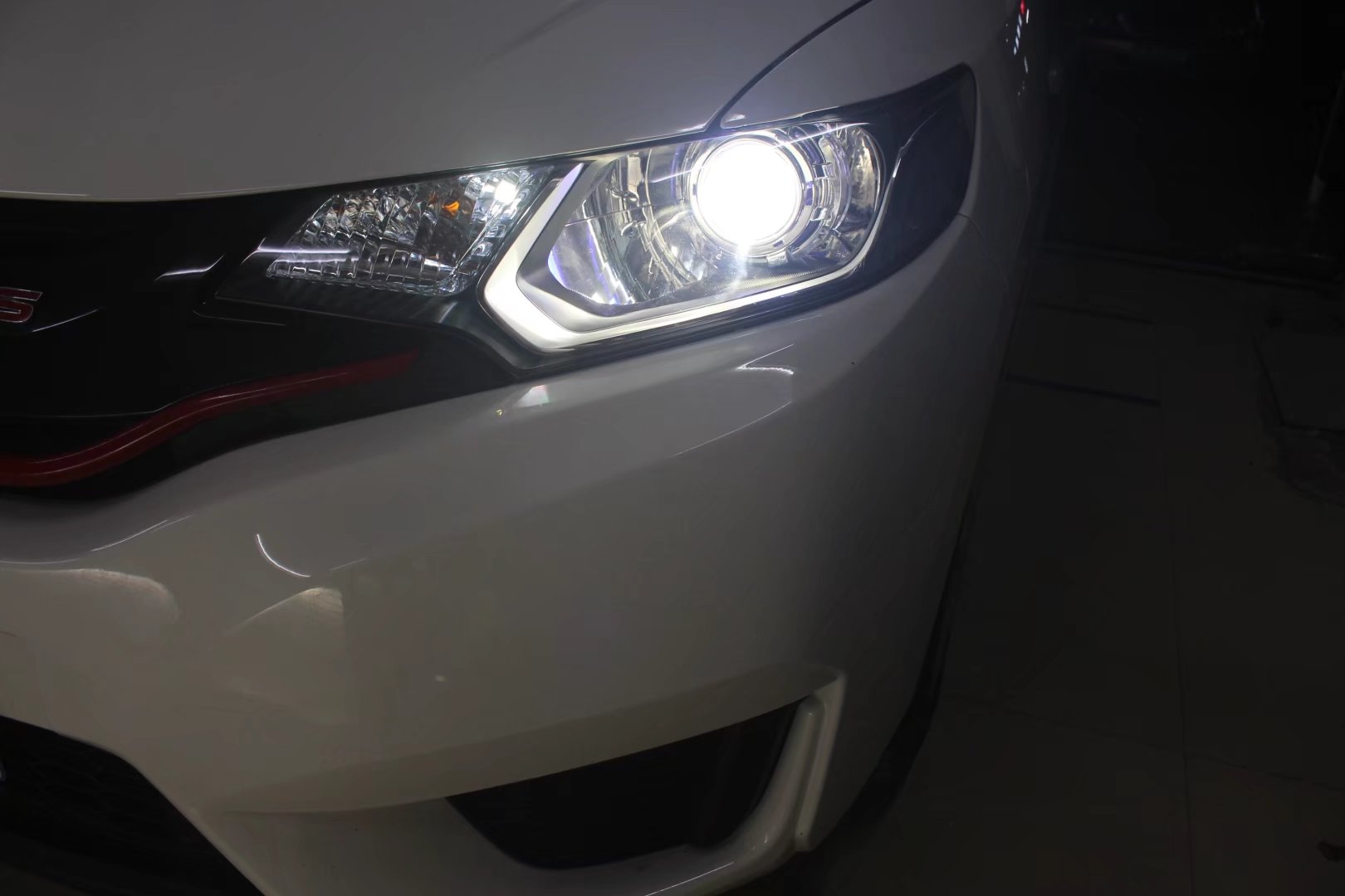 中山四代飞度大灯改装氙气透镜,2023款本田飞度大灯改装